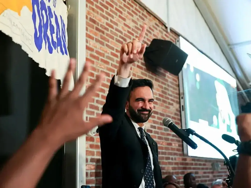 Zohran Mamdani celebrating NYC mayoral primary win with supporters
