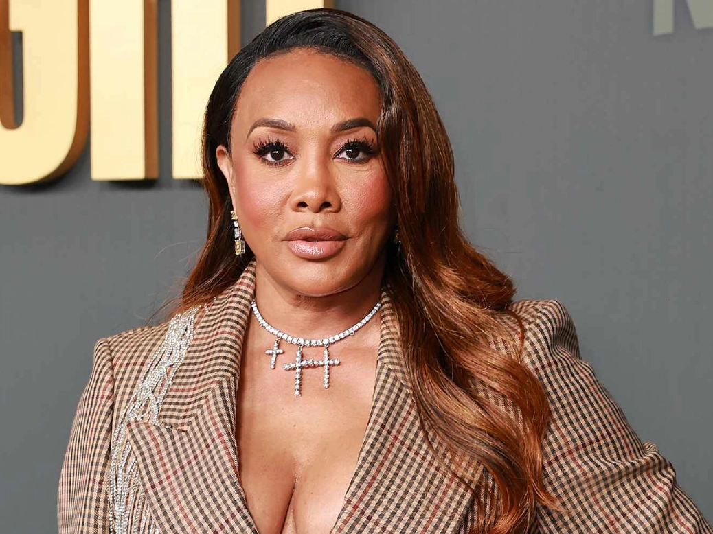 Vivica A. Fox posing confidently at a red carpet event